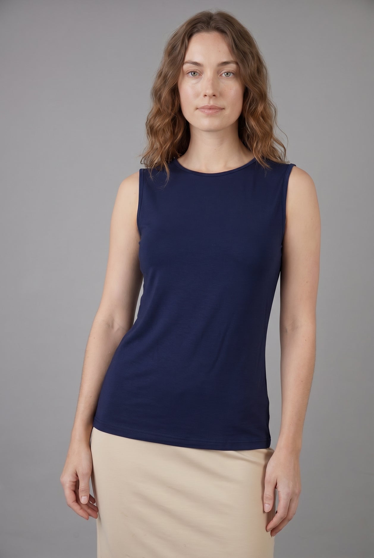 Model wearing Nuggles® Essential Tank in Navy