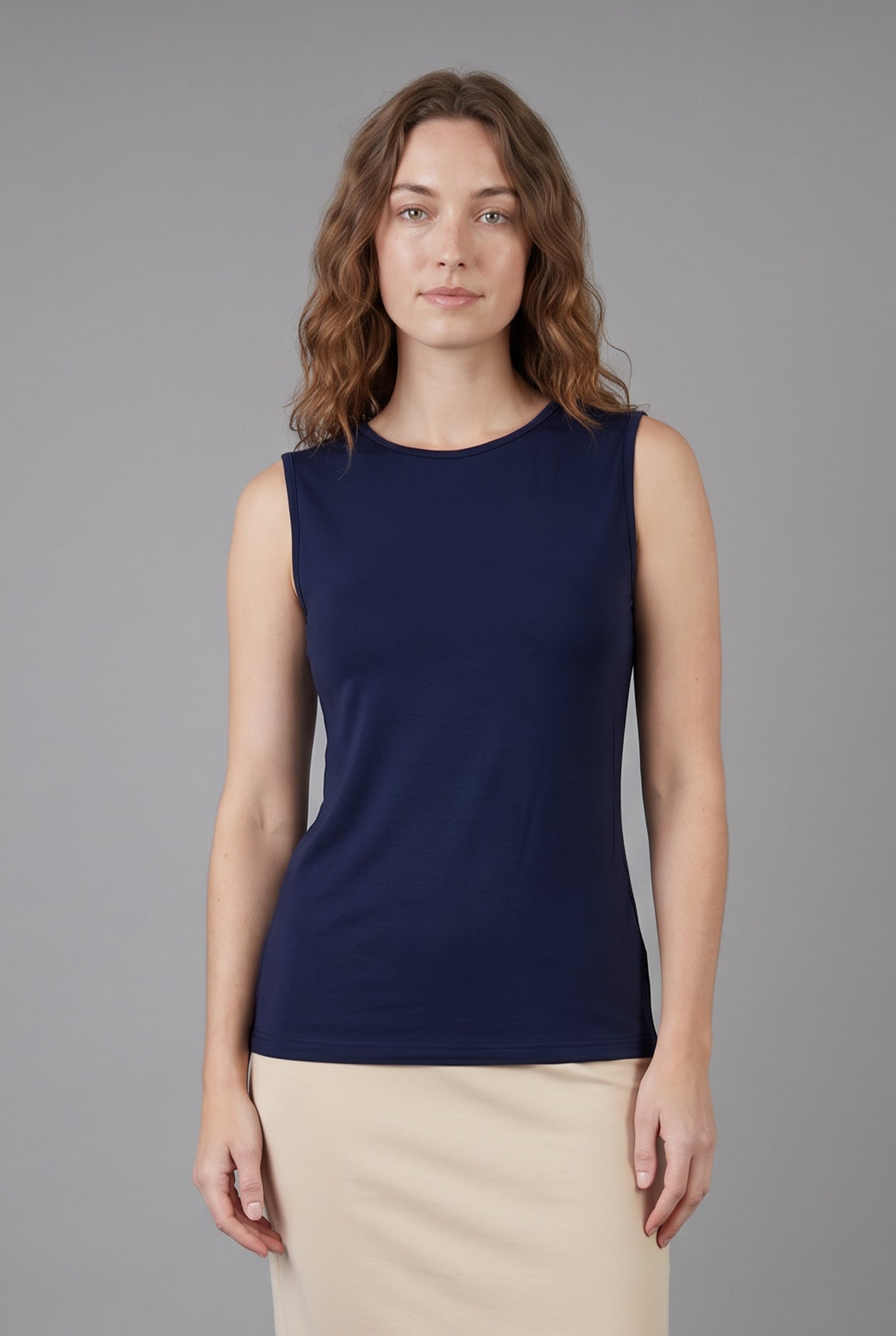 Model wearing Nuggles® Essential Tank in Navy