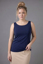 Model wearing Nuggles® Wide Neck Tank in Navy