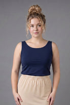 Model wearing Nuggles® Wide Neck Tank in Navy