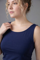 Model wearing Nuggles® Wide Neck Tank in Navy