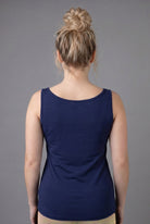 Model wearing Nuggles® Wide Neck Tank in Navy