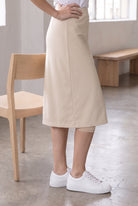 Model wearing Nuggles®  27" Sport Skirt in Nude