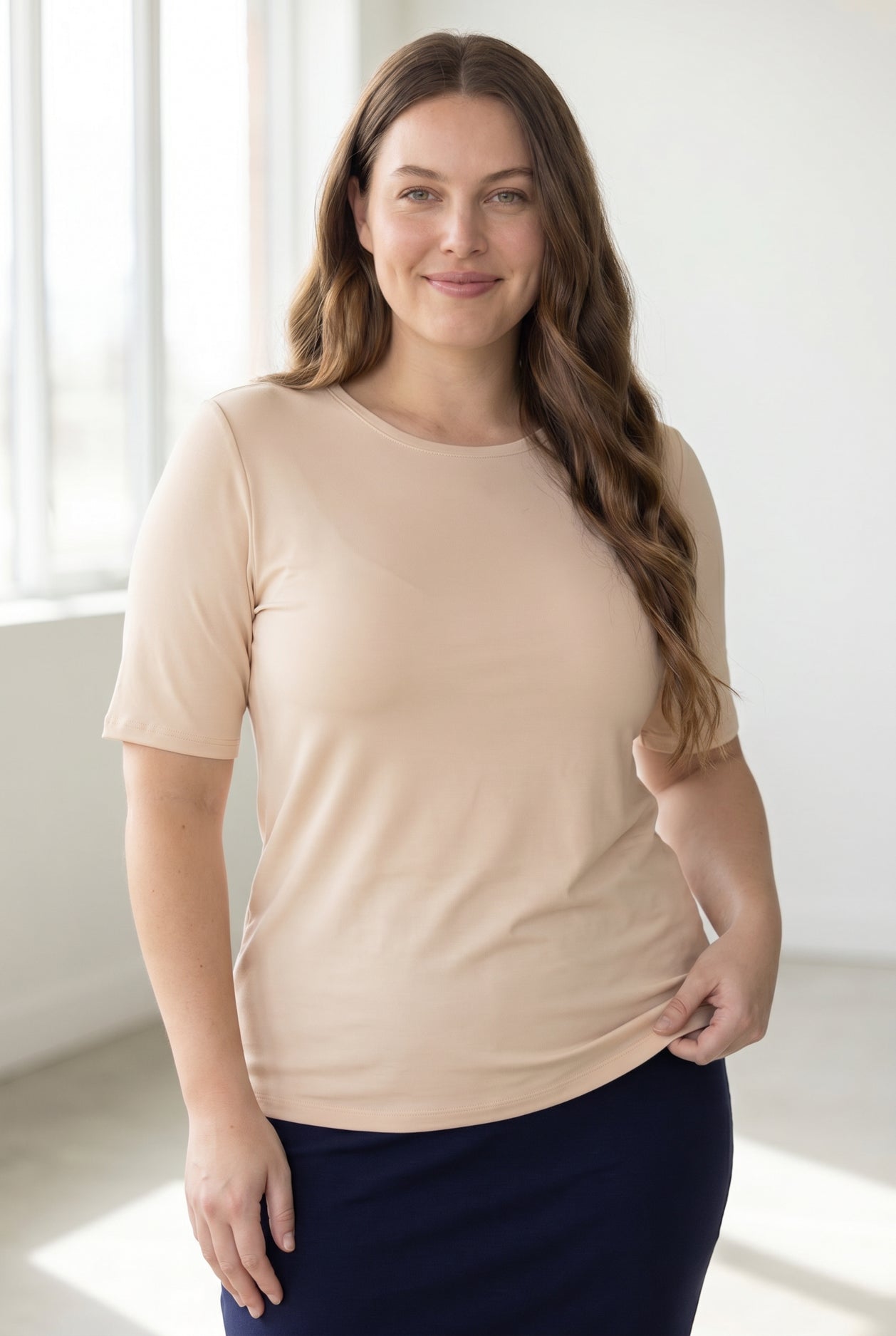 Model wearing the Nuggles® Essential Half Sleeve Tee in Nude