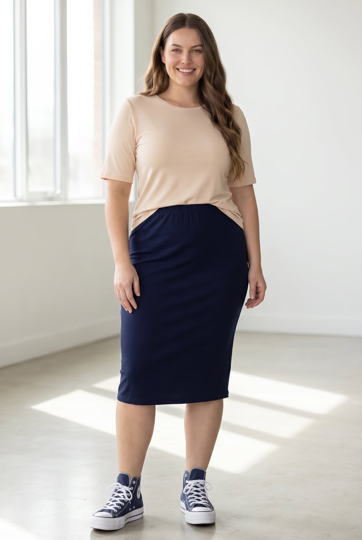 Model wearing the Nuggles® Essential Half Sleeve Tee in Nude