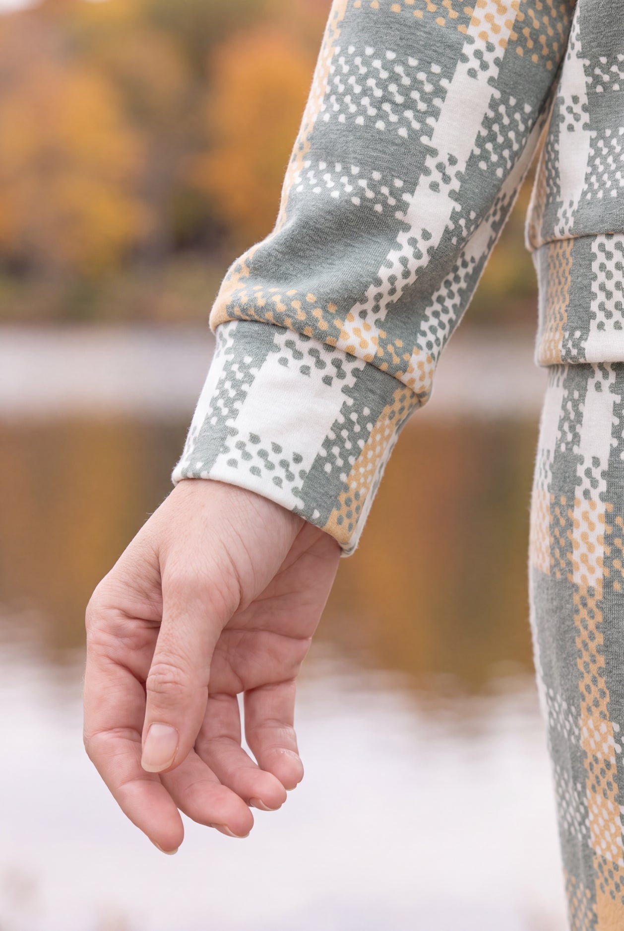 Model wearing Nuggles®  Iris Sweater Shirt in Olive Plaid