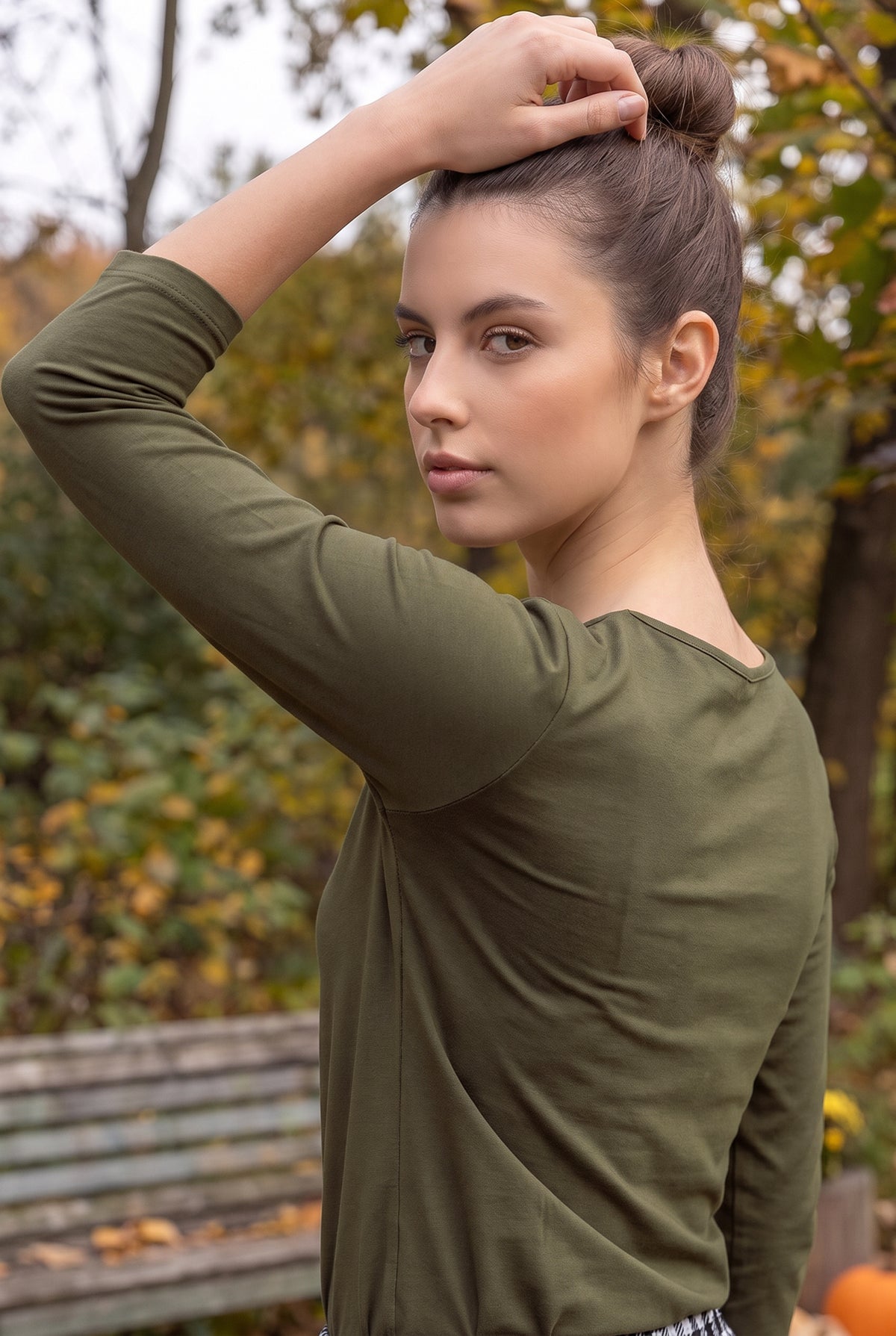 Model wearing Nuggles®  Essential 3/4 Sleeve Tee in Olive