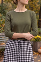 Model wearing Nuggles®  Essential 3/4 Sleeve Tee in Olive