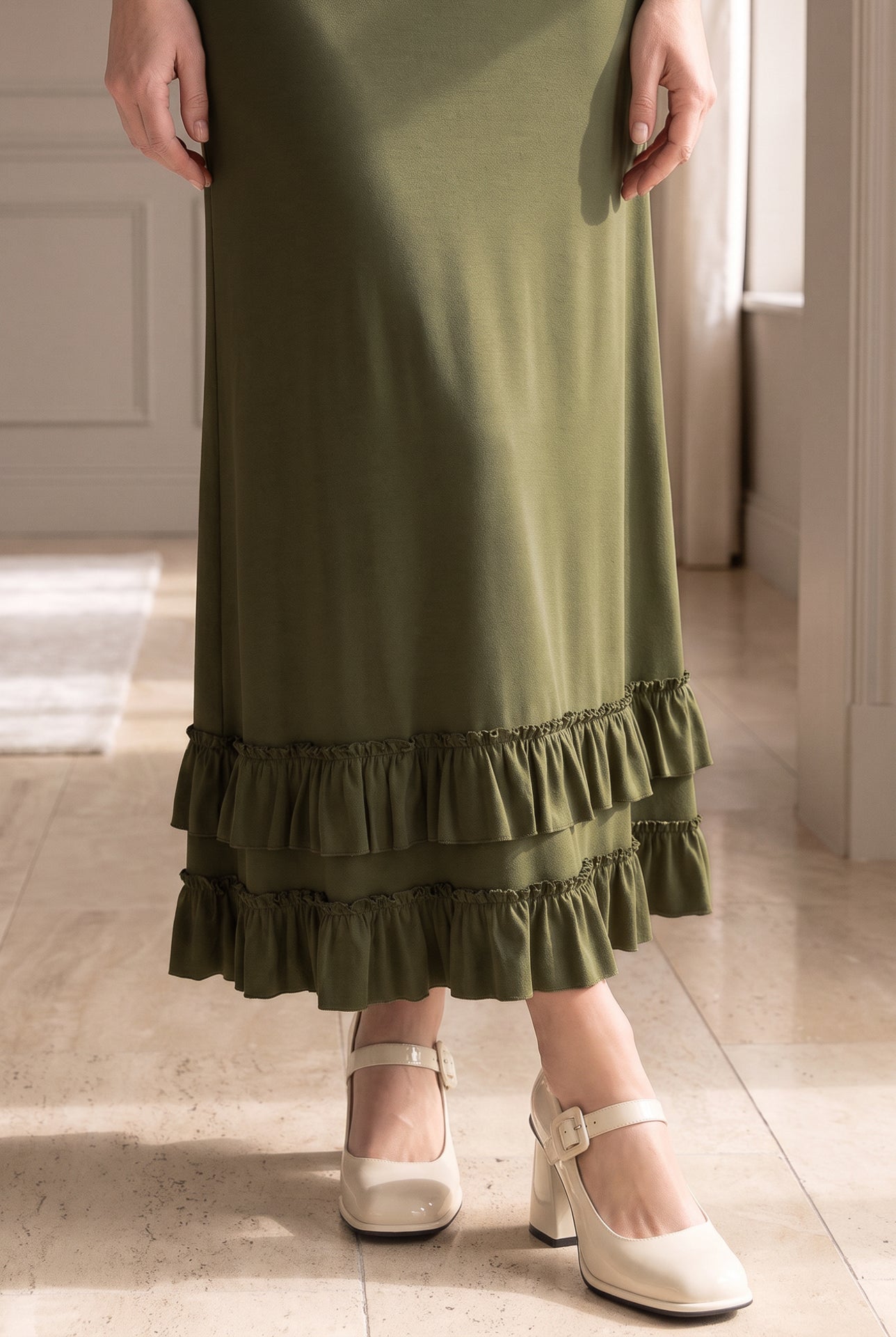 Model wearing Nuggles®  Callie Skirt in Olive