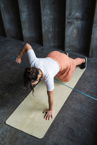 Model wearing Nuggles® 27" All-Sport Skirt in Orange Pop