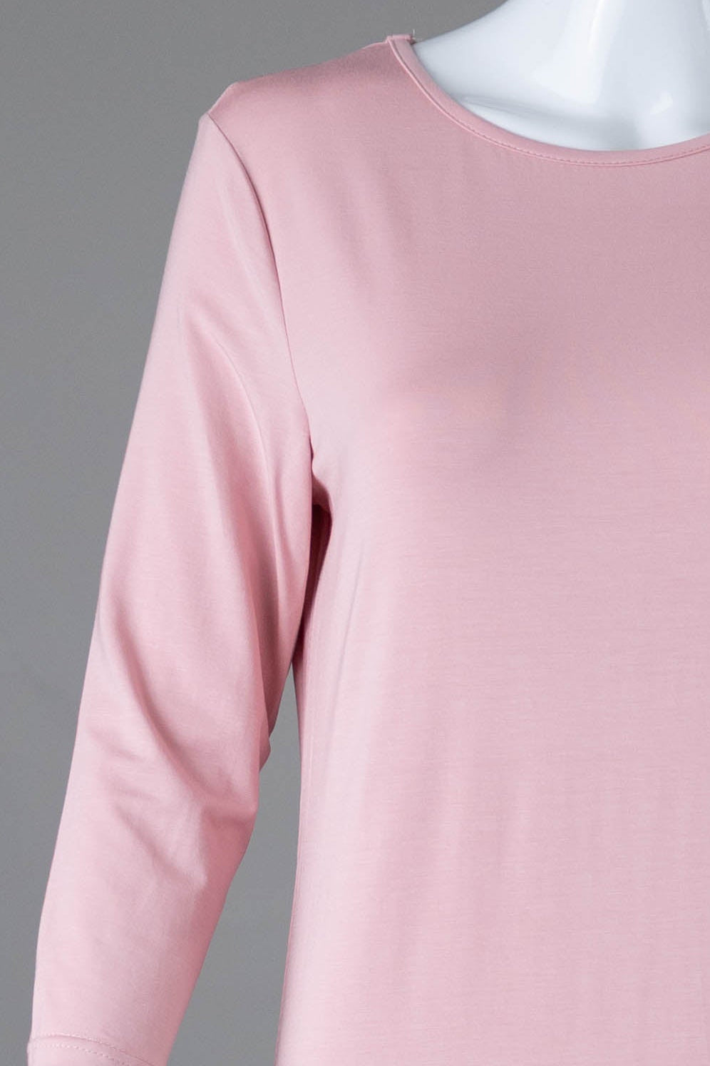 Model wearing Nuggles® Midi Layering Dress in Baby Pink