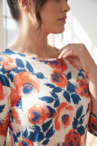 Model wearing Nuggles® 3/4 Essential Tee in Paint Bloom