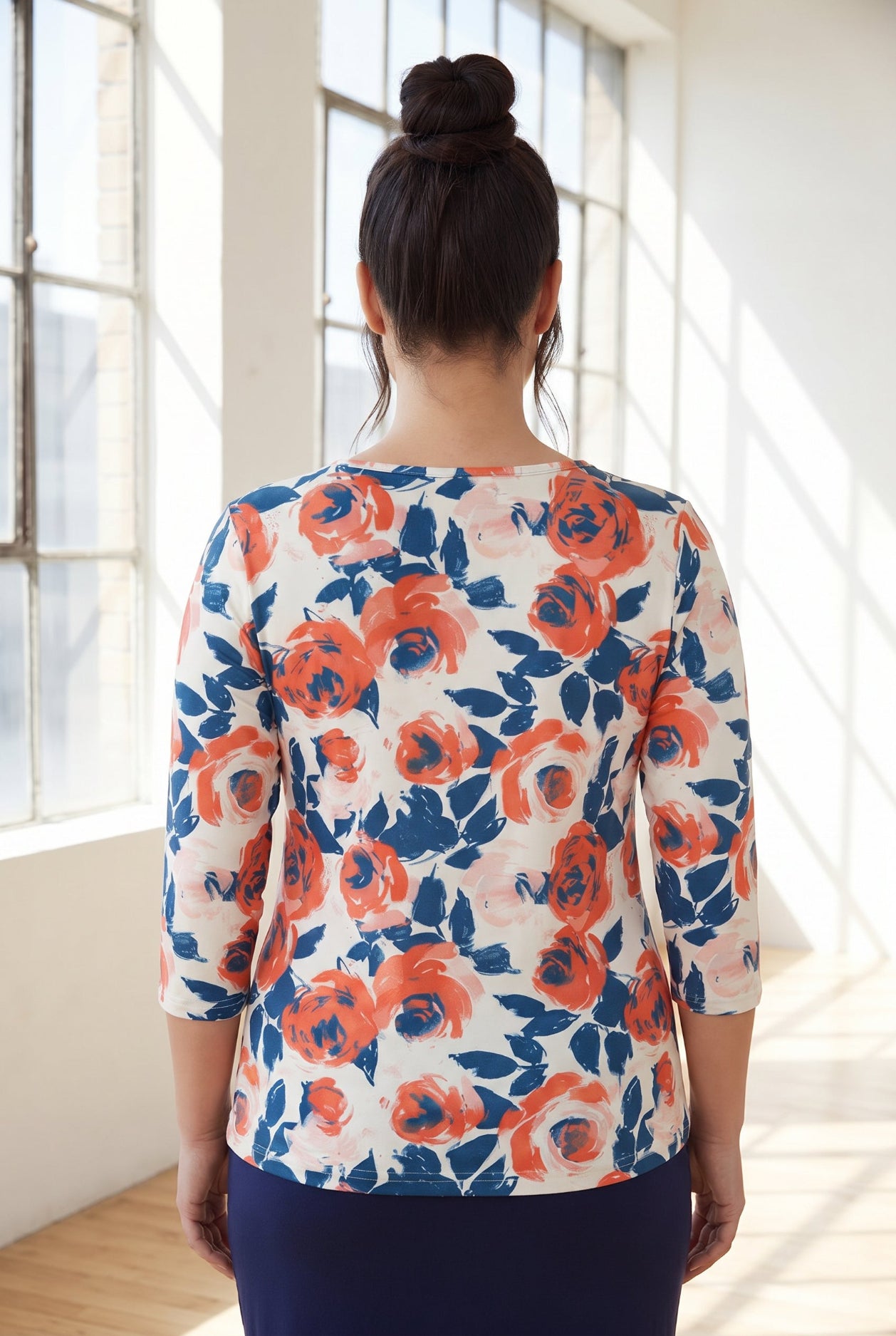 Model wearing Nuggles® 3/4 Essential Tee in Paint Bloom