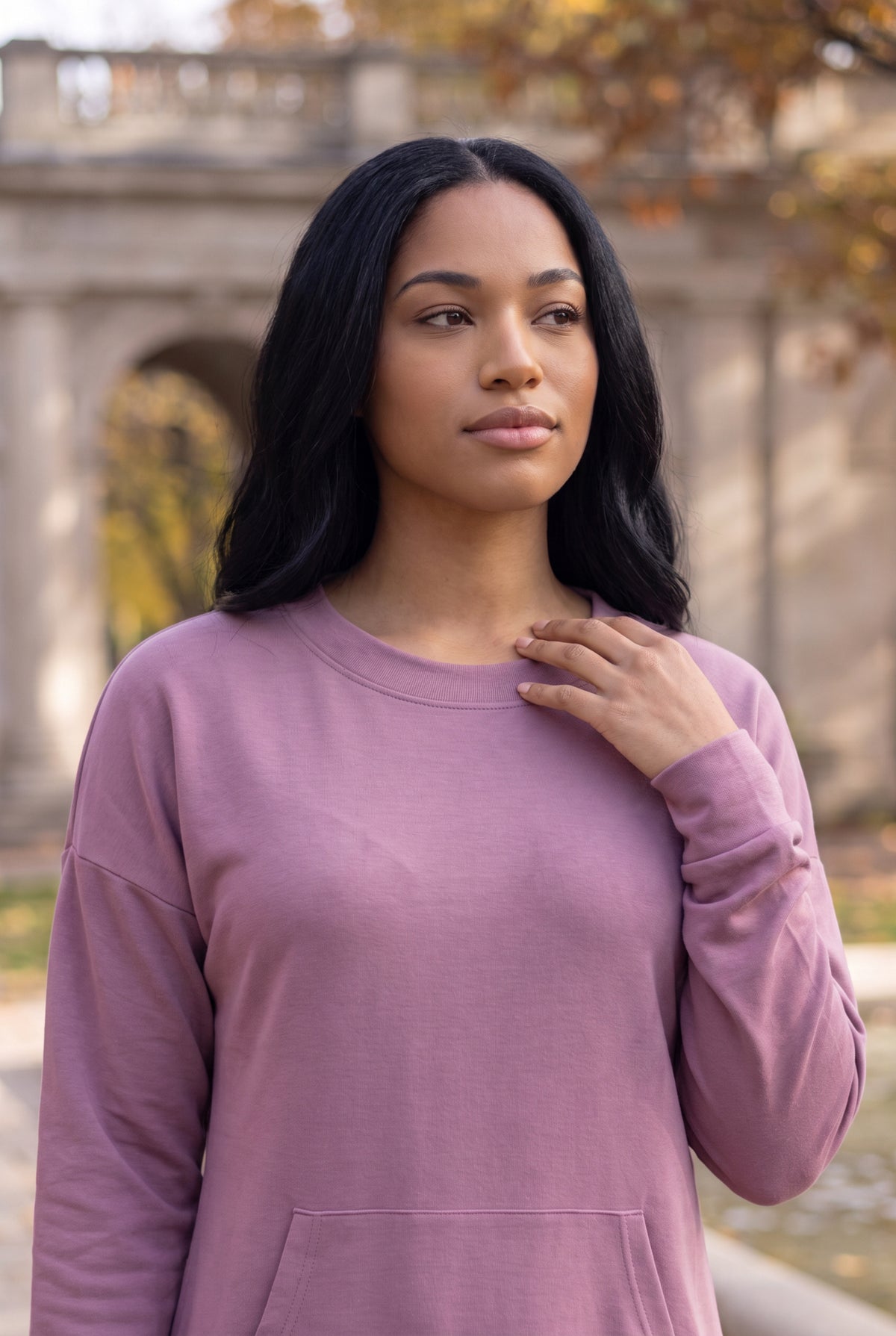 Nuggles® Oakley Hoodie Dress in Pale Purple, waist-up view with a hand at the ribbed crew neckline