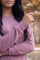 Nuggles® Oakley Hoodie Dress in Pale Purple, close-up of the long sleeves with arms crossed at the waist