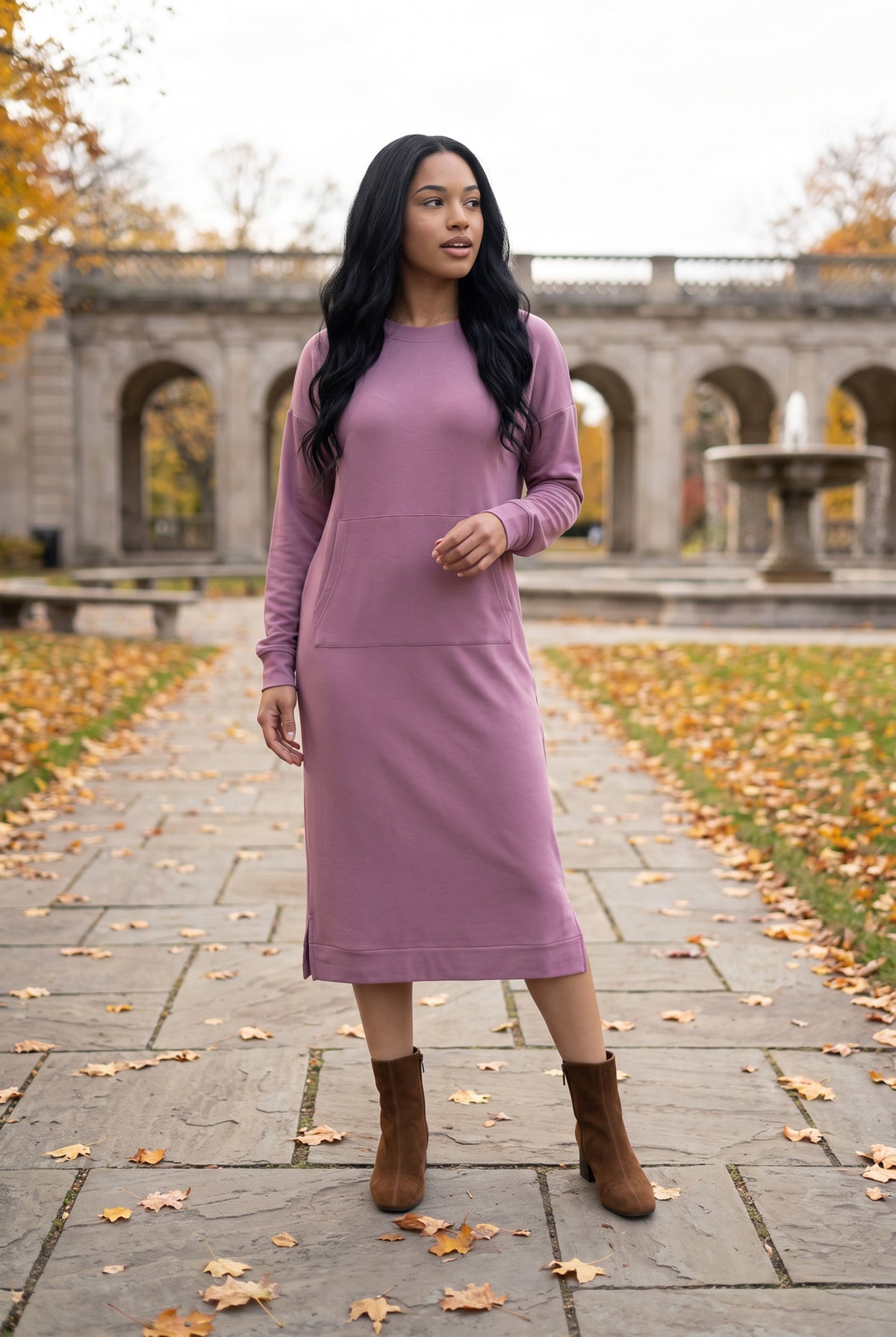 Nuggles® Oakley Hoodie Dress in Pale Purple, full-length front view on a leaf-covered park path with brown ankle boots