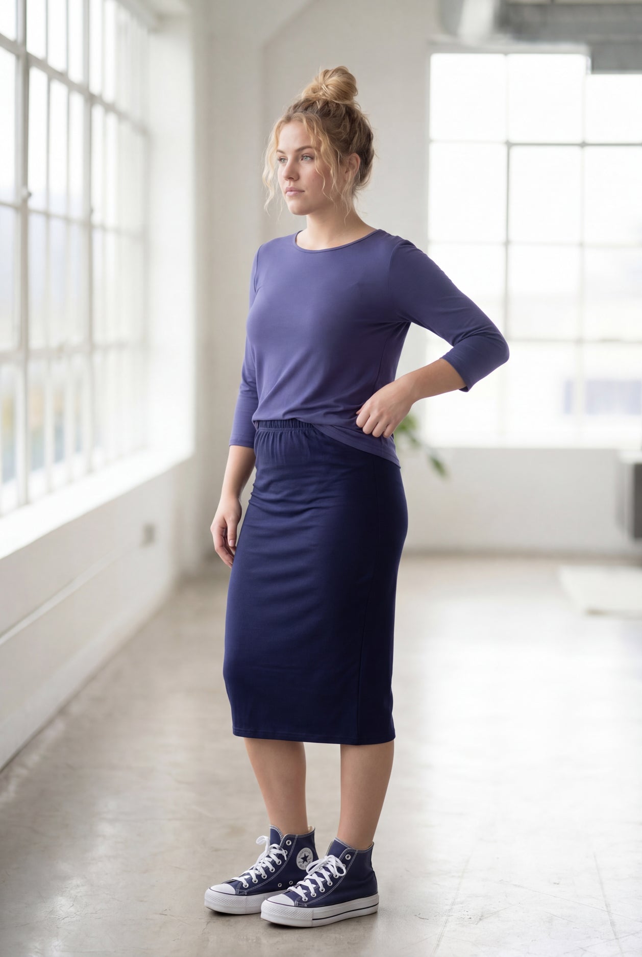 Model wearing Nuggles® 3/4 Essential Tee in Periwinkle Purple