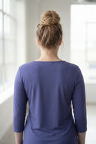 Model wearing Nuggles® 3/4 Essential Tee in Periwinkle Purple