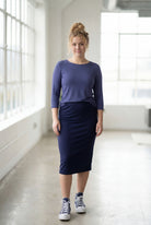 Model wearing Nuggles® 3/4 Essential Tee in Periwinkle Purple