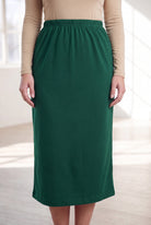 Nuggles® 31" Classic Skirt in Pine Green, waist-to-hem front view showing the straight knit drape