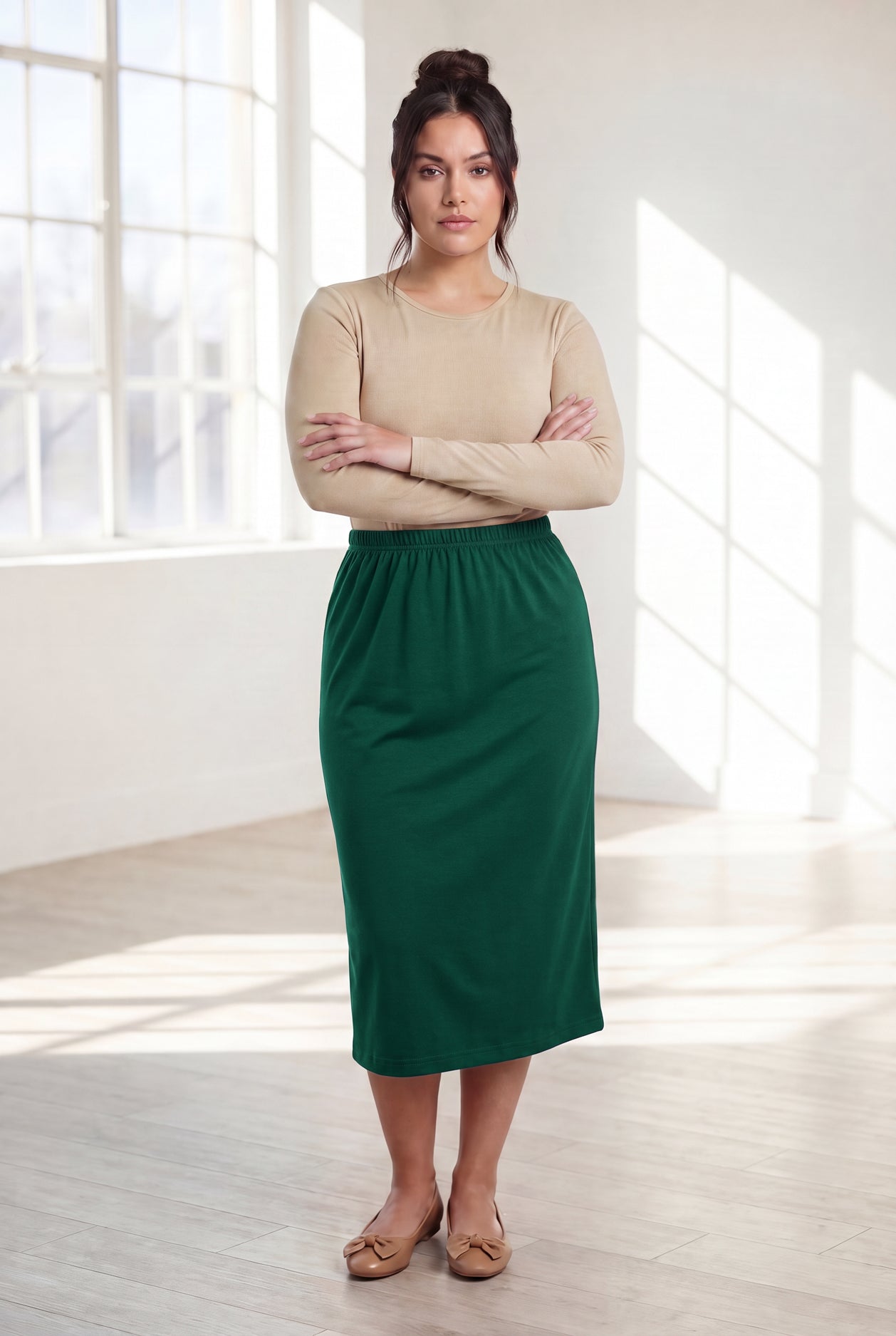 Model wearing Nuggles®  31" Classic Skirt in Pine Green