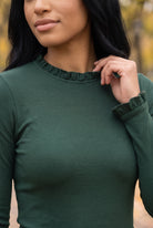 Model wearing Nuggles®  Bethany Shirt & Skirt in Pine Green