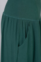 Model wearing Nuggles®  Bethany Shirt & Skirt in Pine Green