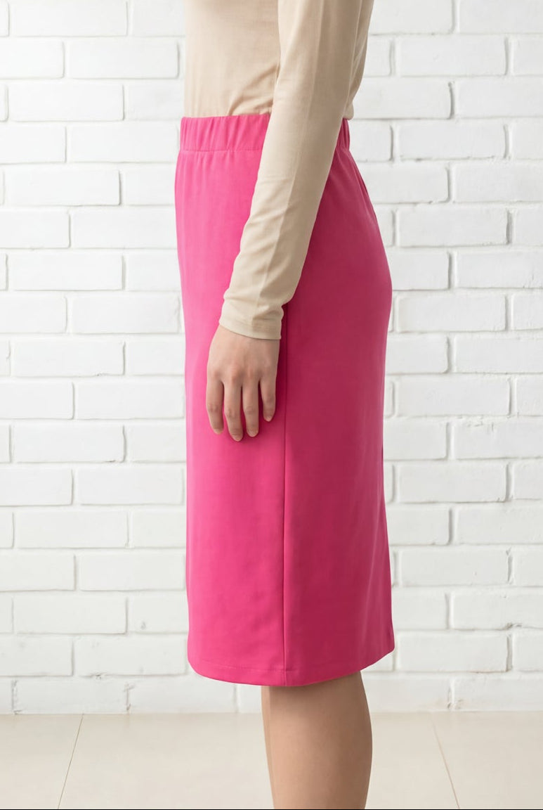 Model wearing Nuggles® 25" Relaxed Midi Skirt in Pink 