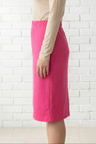 Model wearing Nuggles® 25" Relaxed Midi Skirt in Pink 