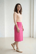 Model wearing Nuggles® 27" Relaxed Midi Skirt in Pink 