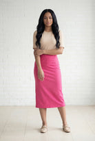 Model wearing Nuggles® 31" Relaxed Midi Skirt in Pink 