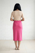 Model wearing Nuggles® 31" Relaxed Midi Skirt in Pink 