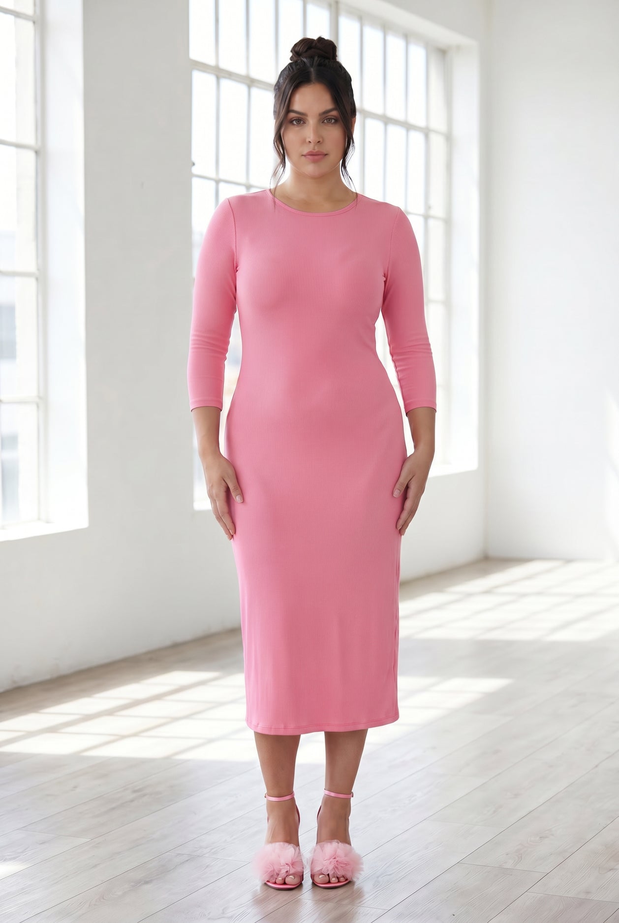 Model wearing Nuggles® Ribbed Midi Layering Dress in Pink