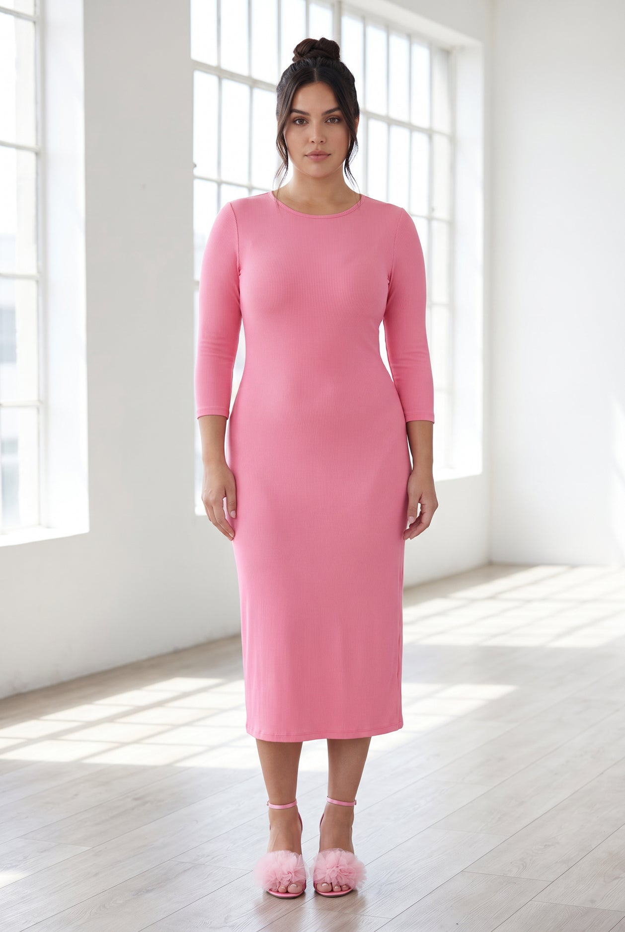 Model wearing Nuggles® Ribbed Midi Layering Dress in Pink