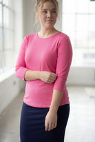 Model wearing Nuggles® 3/4 Essential Tee in Pink