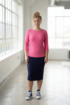 Model wearing Nuggles® 3/4 Essential Tee in Pink