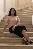 Model wearing Nuggles®  Helena Top in Dusty Pink