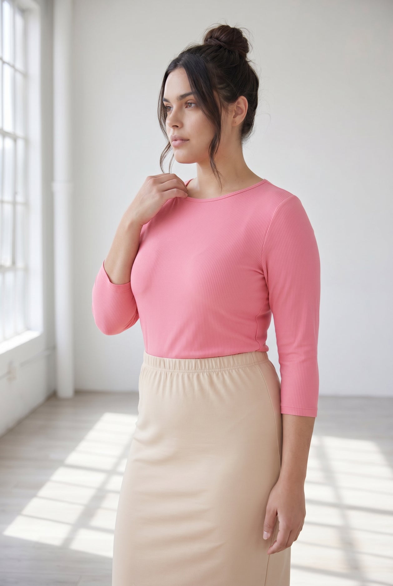 Model wearing Nuggles® 3/4 Essential Ribbed Tee in Pink