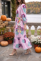 Model wearing Nuggles®  Leila Dress in Plum Poppy