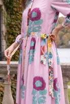 Model wearing Nuggles®  Leila Dress in Plum Poppy