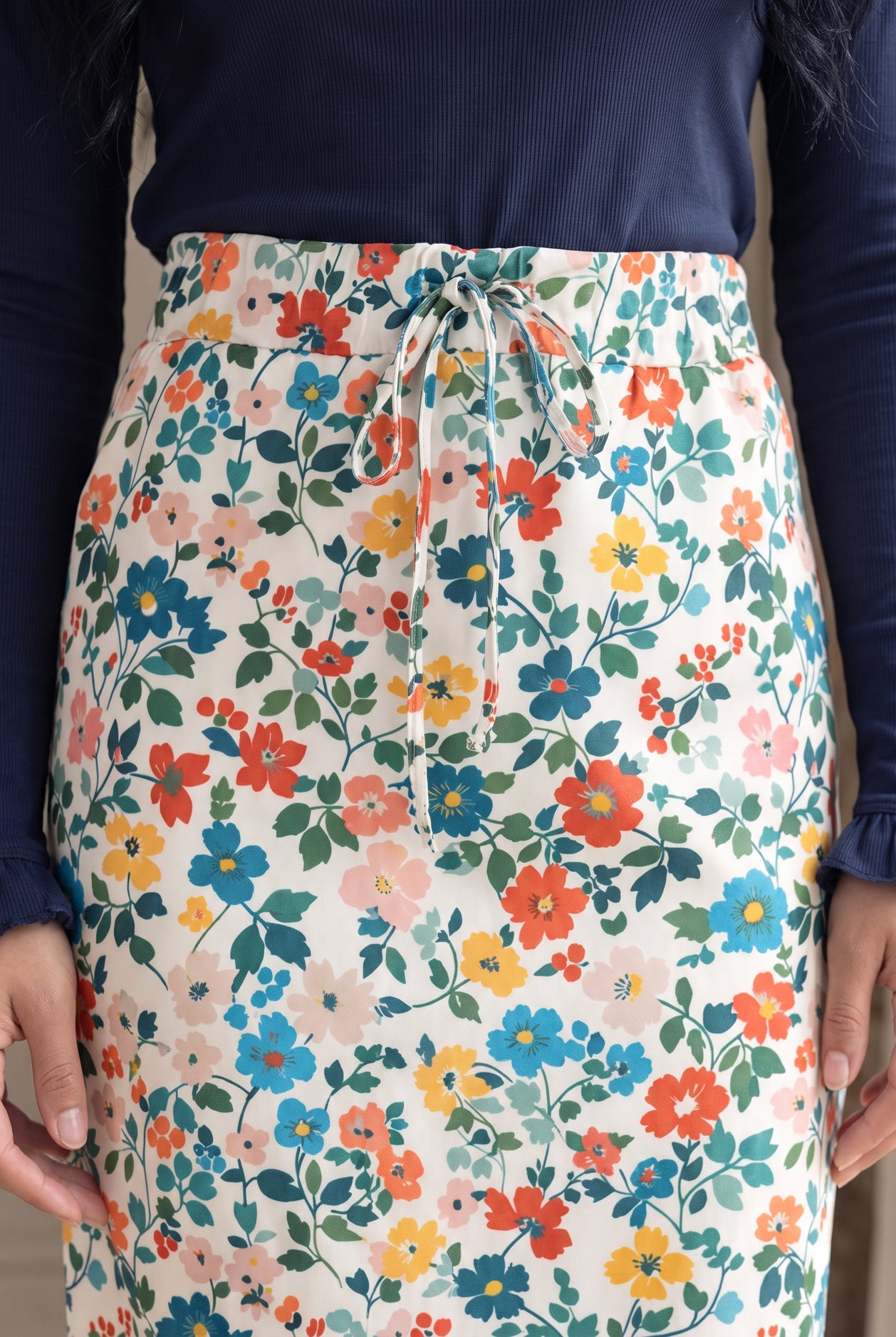 Model wearing Nuggles®  31" Drawstring Skirt in Posy Lane