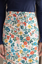 Model wearing Nuggles®  31" Drawstring Skirt in Posy Lane