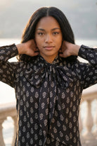 Nuggles® Felicity Bow Top in Quiet Black elegant womens blouse with feminine bow detail