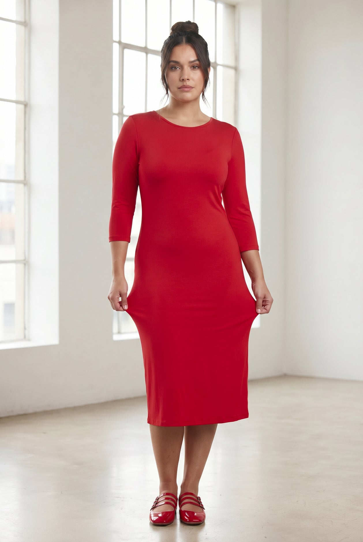Model wearing Nuggles® Midi Layering Dress in Red