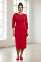 Model wearing Nuggles® Midi Layering Dress in Red