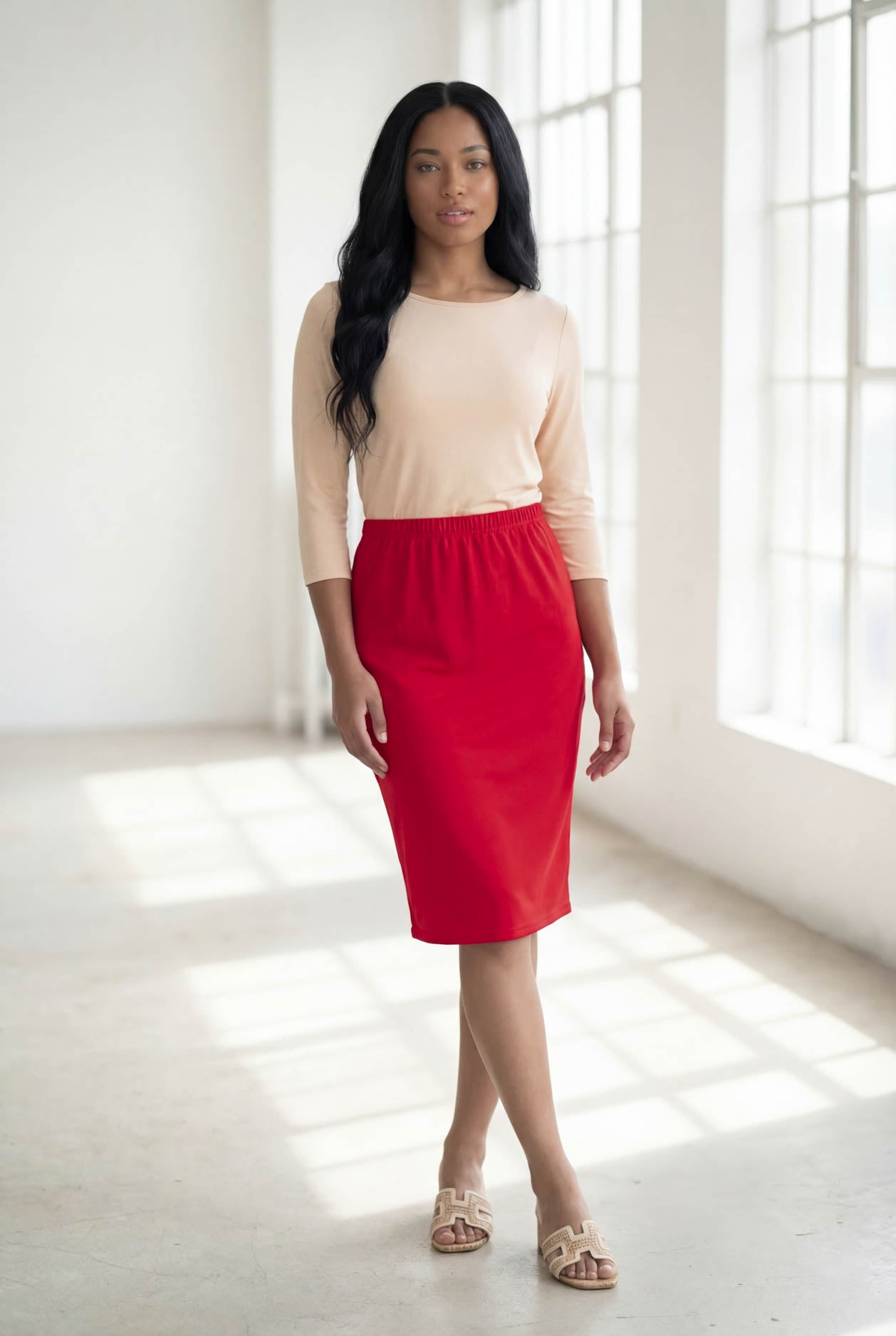 Model wearing Nuggles® 25" Classic Skirt in Red