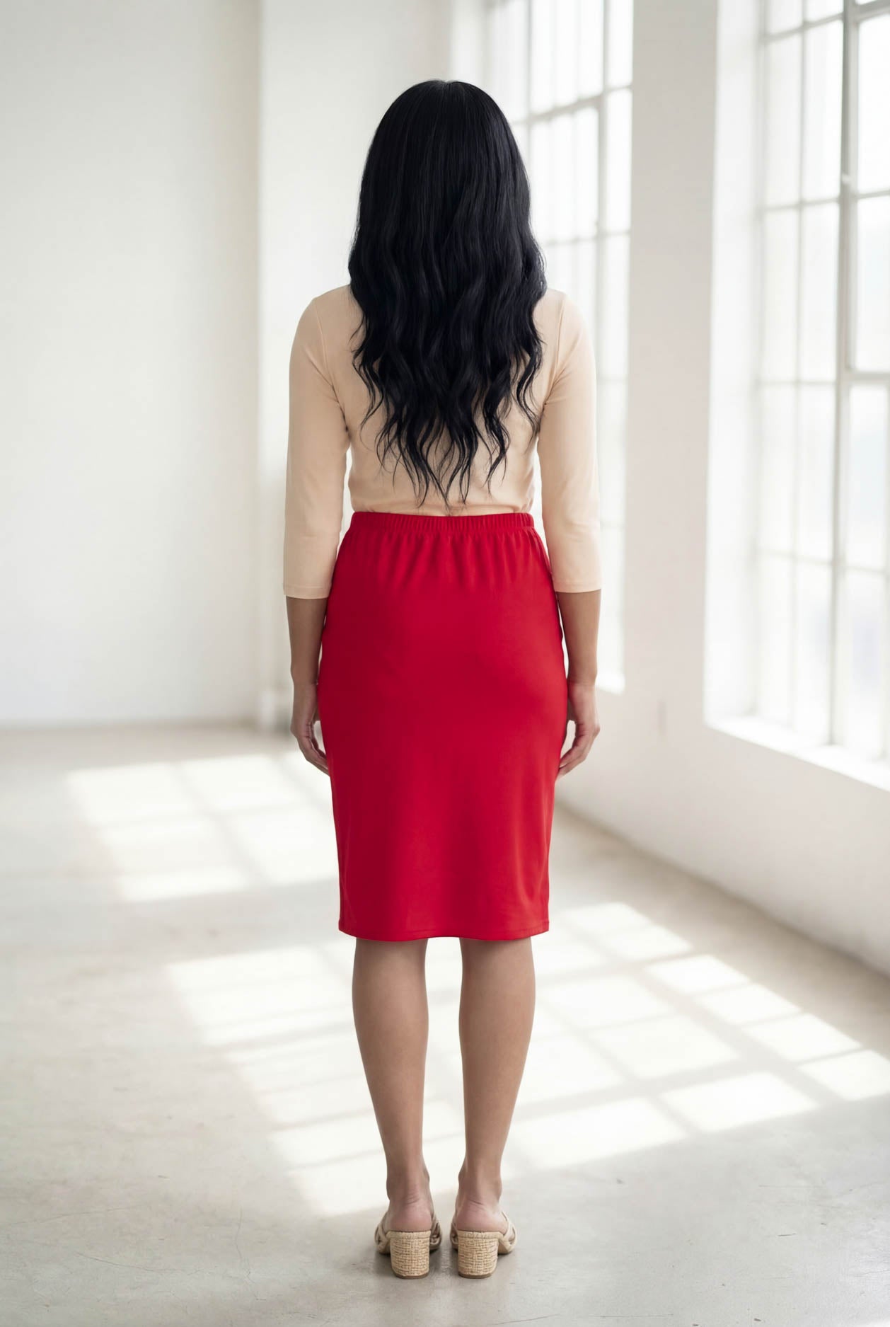 Model wearing Nuggles® 25" Classic Skirt in Red