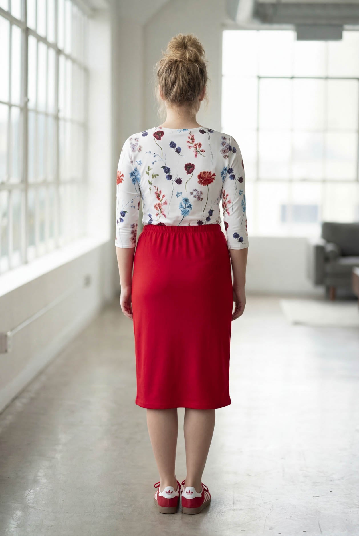 Model wearing Nuggles® 27" Classic Skirt in Red
