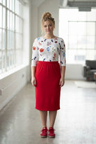 Model wearing Nuggles® 27" Classic Skirt in Red