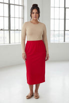 Model wearing Nuggles® 31" Classic Skirt in Red